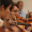 A student violinist playing in section.